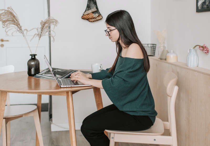Young girl applying to school online