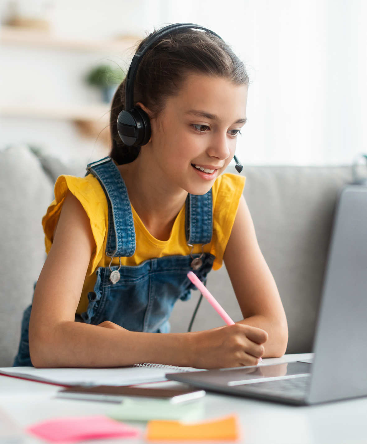 Happy student in class after enrolling to Online School