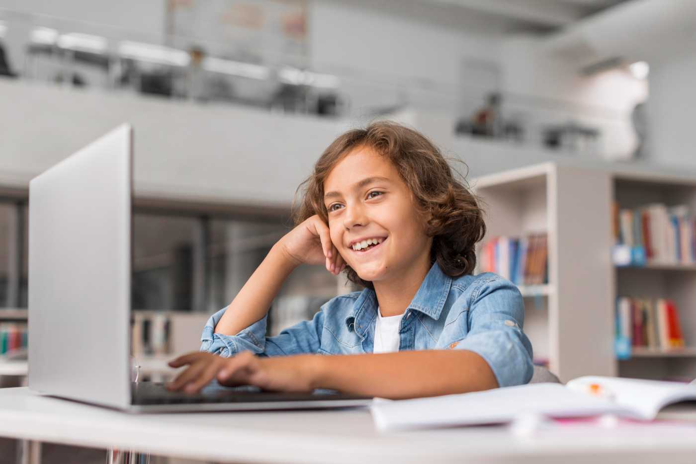 Happy boy in Online Middle School Class